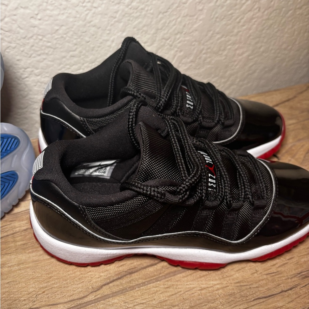 Jordan 11s low Black and Red Men's Sneakers